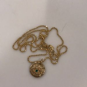 Emerald Baby Eye of Protection Coin Pendant.